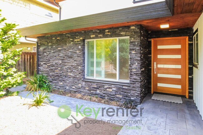 Building Photo - Waterfront Elegance with Private Dock and Designer Finishes