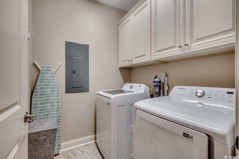 Great sized laundry room with cabinets for plenty of storage - 144 Puffin Dr