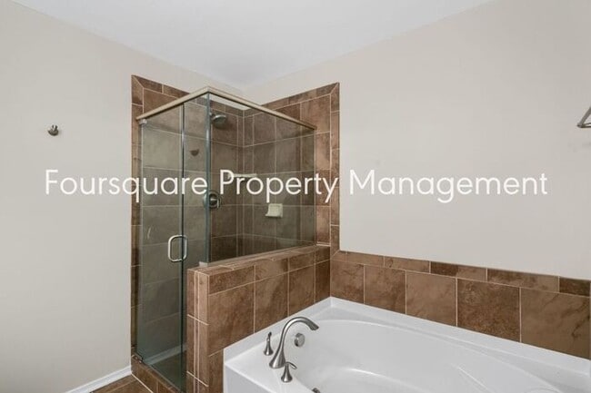 Building Photo - Charming Townhome with Open Layout, Back Patio & One-Car Garage – Near RTP, RDU & Everyday Conven...