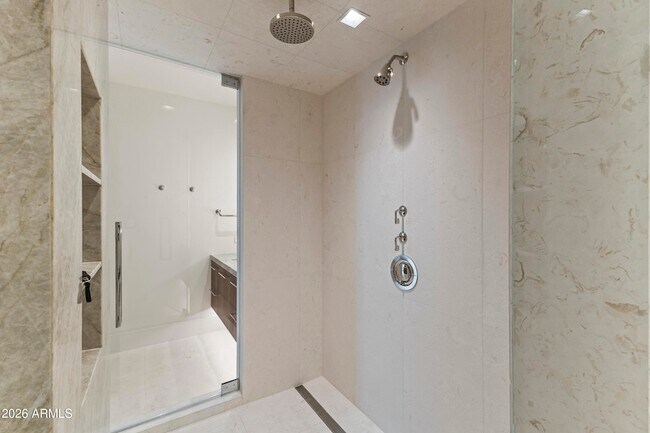 Building Photo - 6587 N Palmeraie Blvd