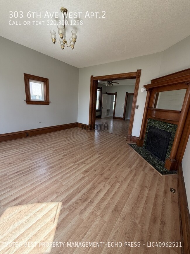 Building Photo - 303 6th Ave W