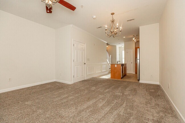 Building Photo - Located just Steps from Shopping, Dining, ...