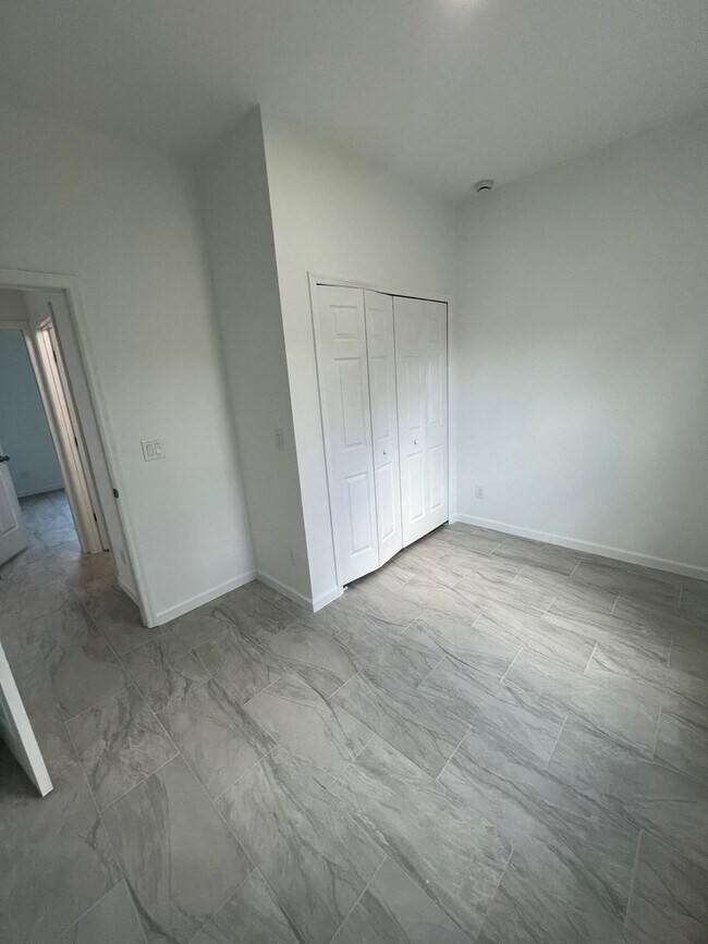 Building Photo - Brand-New 3BR/2BA Home with Garage – Serene Lake Placid Neighborhood