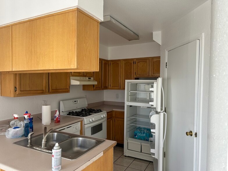 Kitchen with refrig, stove and dishwasher - 1345 Trudy Elaine Dr