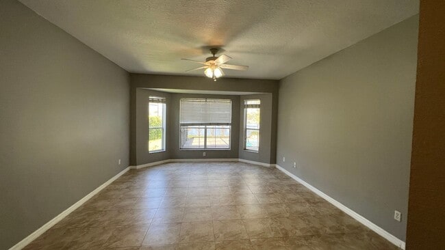 Building Photo - Spacious 4/3.5 Pool Home with Water View & 3-Car Garage in Lee Vista Area (close to Lake Nona)