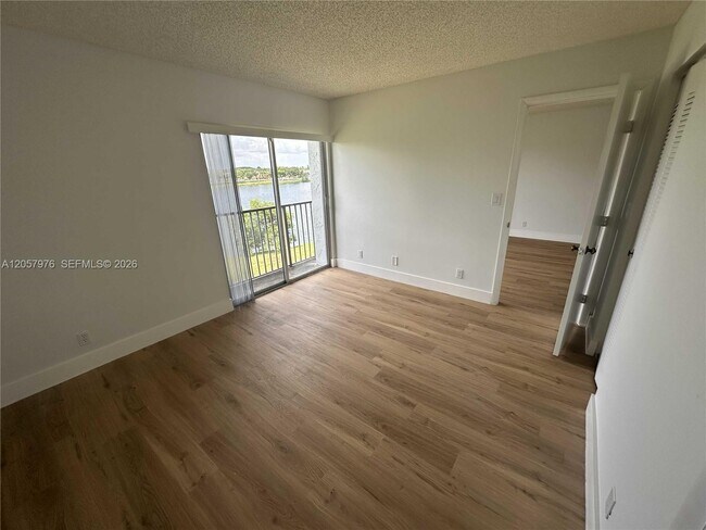 Building Photo - 8560 N Sherman Cir