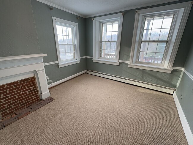 Building Photo - 3 Floor Farmhouse with Spacious Land