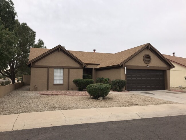 Front of home, corner house - 10101 W Orange Dr