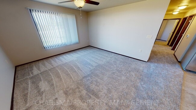 Building Photo - LOWER LEVEL 3 BEDROOM, 2 BATH TOWN HOME, INDIVIDUAL ENTRANCE, DOUBLE ATTACHED GARAGE, PET FRIENDLY