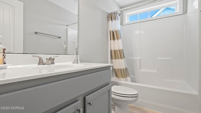 Building Photo - 4BR Home in The Landing at Mill Creek | Bonus Room + Fenced Yard w/ Pergola