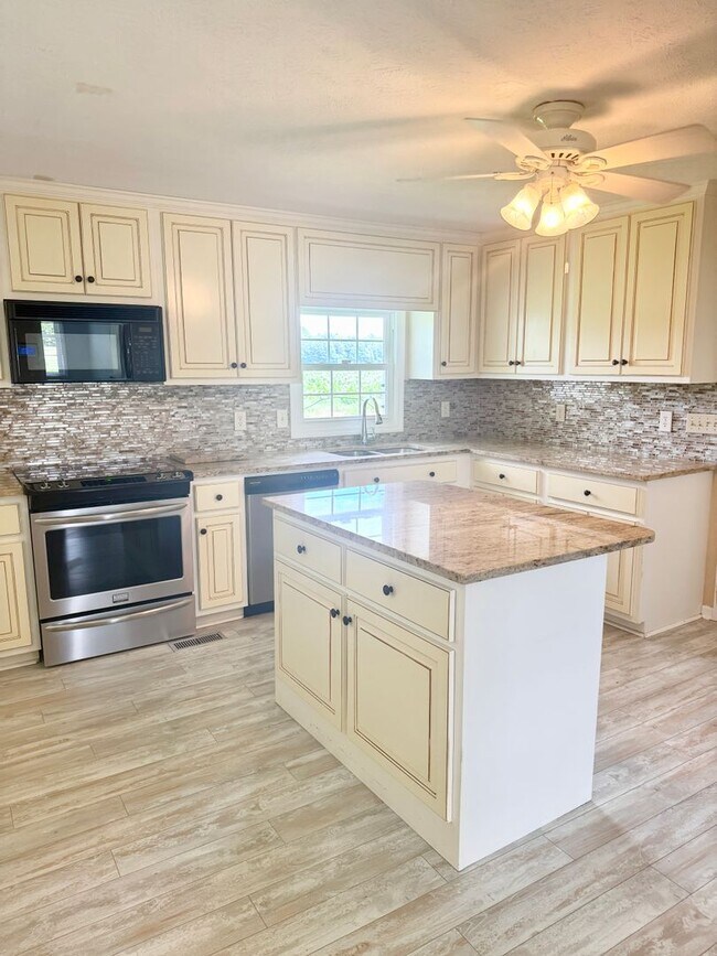 Building Photo - Hard-to-Find Home with Garage & Detached Shed & Modern Updates