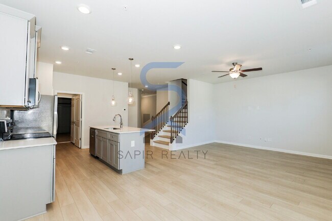 Building Photo - Move in before February 28th and choose your reward: a $250 Amazon Gift Card or a 55" Smart TV!