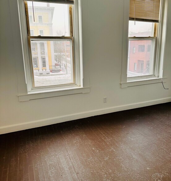 Living room with view of Main Street - 1214 Main St