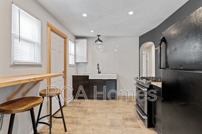 Building Photo - 4539 Crittenden Ave