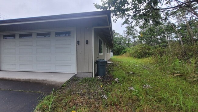 Building Photo - This 3-bedroom, 2-bath home in Orchidland Subdivision