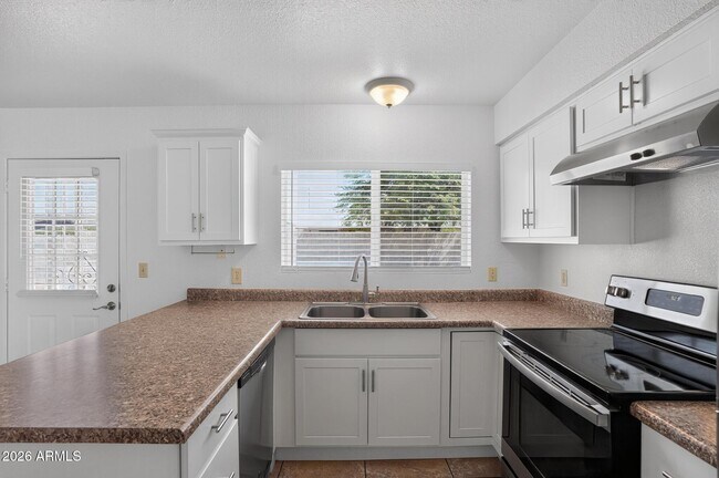 Building Photo - 6320 W Carol Ave