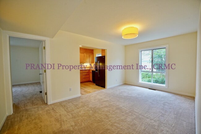 Building Photo - Wood burning fireplace in this updated 2 b...