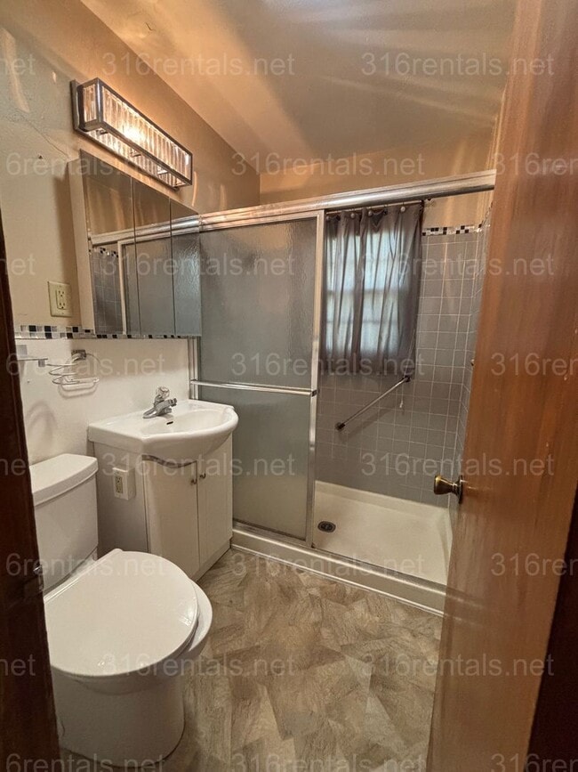 Building Photo - Three bedroom one bath house available now!