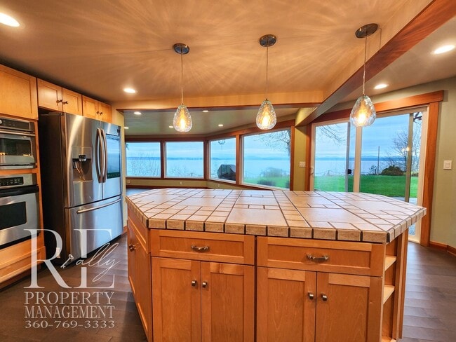 Building Photo - MOVE-IN SPECIAL: 50% OFF FIRST MONTHS RENT - Waterfront Rustic Retreat with Vaulted Ceilings, Pic...