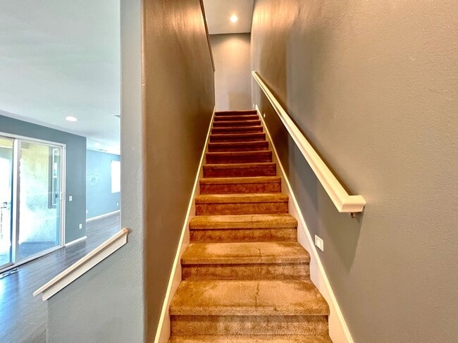 Building Photo - Beautiful 4 Bedroom Condominium with Attached Garage Located in Gated Community of Eastvale
