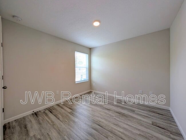 Building Photo - 9027 Cocoa Ave