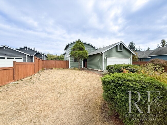 Primary Photo - Spacious 4-Bedroom Home with Fenced Yard &...