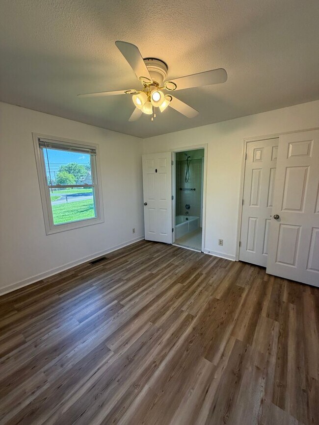 Building Photo - Situated in the heart of Sango, massive lot, and includes a fully finished & recently remodeled b...