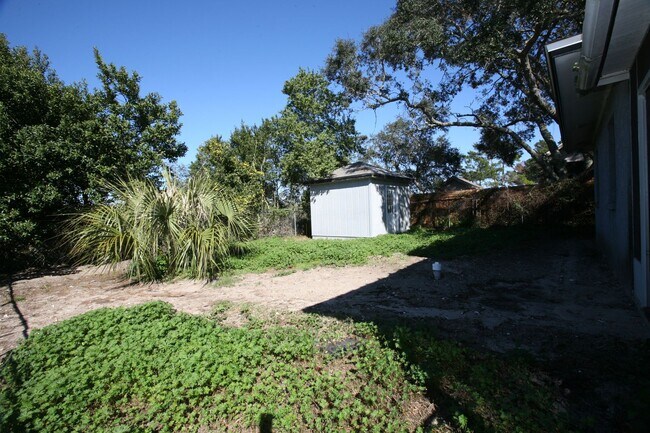 Building Photo - 3 bedroom home with large yard on the west end!