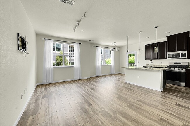 Building Photo - $2,199- 2 Bed, 2 Bath Ground Floor Condo with AC, and In Unit Laundry!