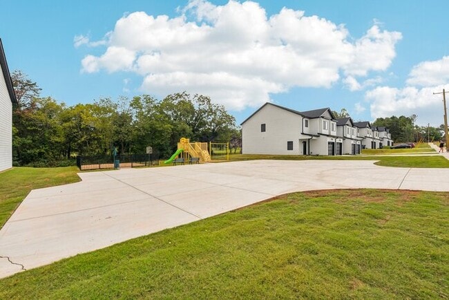 Building Photo - Brand-New Luxury Townhomes – 1st Month Fre...