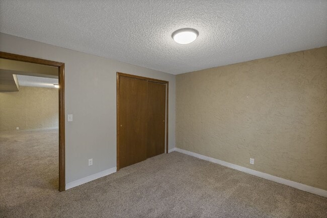 Building Photo - Spacious 4-Bedroom Home with Finished Basement, Large Deck & 2-Car Garage