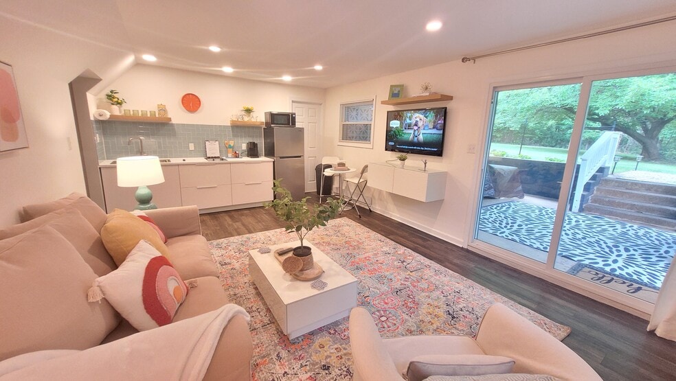 Living room with Sliding doors to private patio.. - 122 Phillips Cir