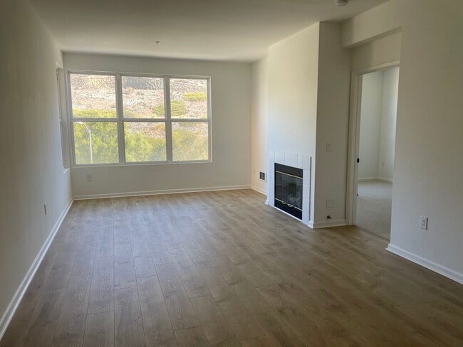 Bright living room with views of a peaceful hillside - 1 Crescent Way