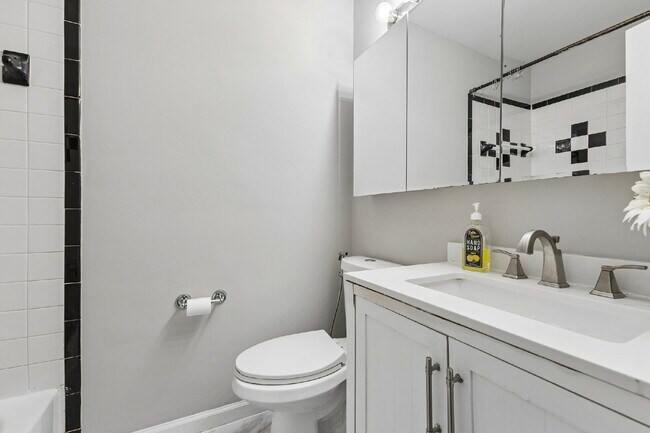 Building Photo - Beautifully remodeled two-level townhouse located in the desirable Irongate Community,
