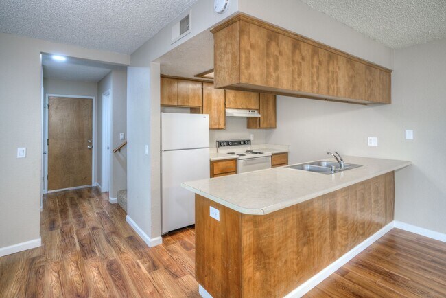 Building Photo - Greenwood Estates has an Excellent 2 Bedroom, 1.5 Bath Townhouse with a Backyard and Garage!