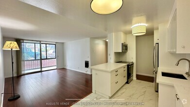 Building Photo - Beautifully Renovated Condo in Prime Location