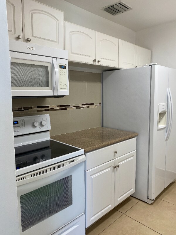 Building Photo - 4975 SW 129th Ct