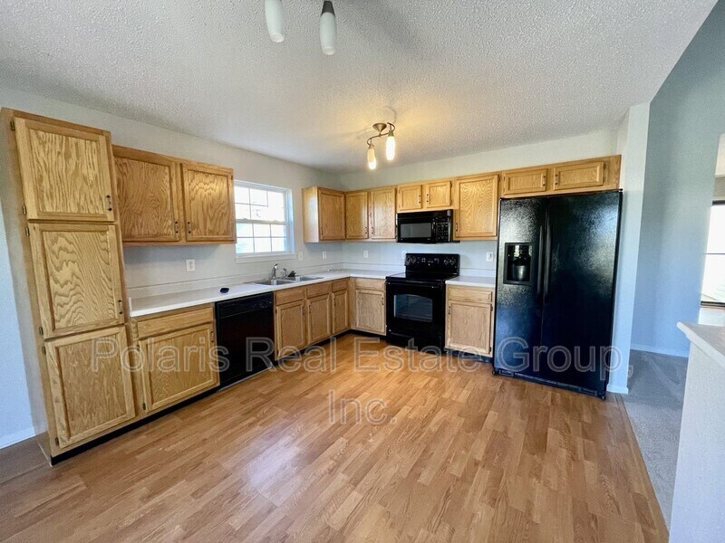 Building Photo - 8241 Brambleberry Dr