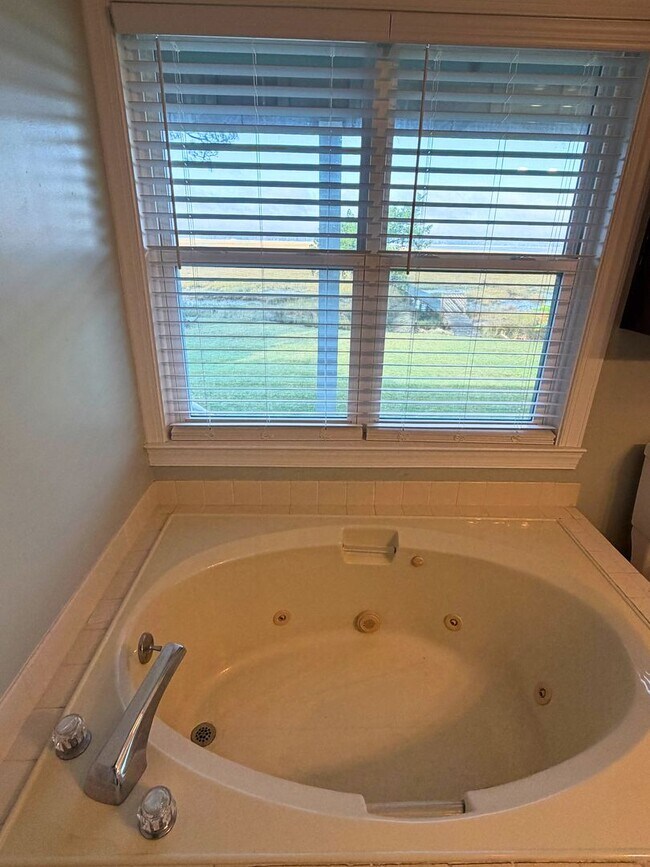 Building Photo - Spacious 4 Bedroom, 2.5 Bath Home with Stunning Marsh Views