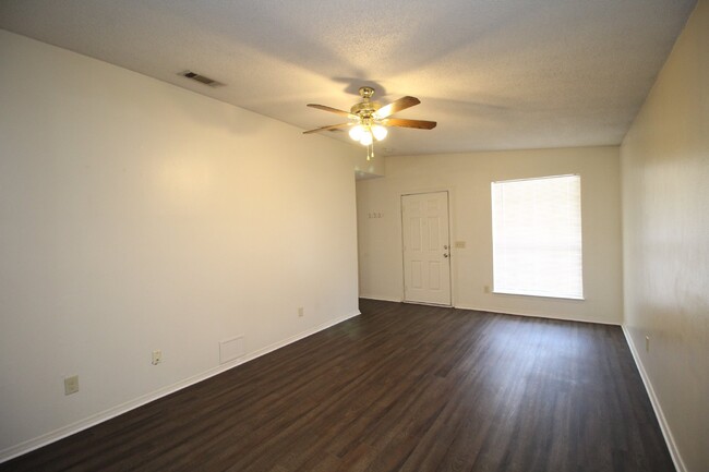 Building Photo - 3/2 brick with fenced backyard in SW Pensa...