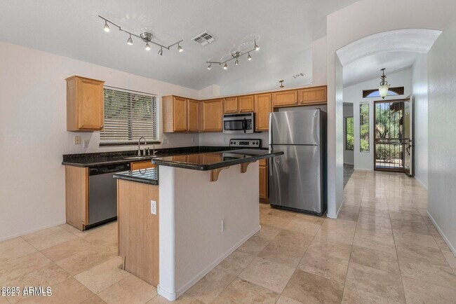 Building Photo - 10307 E Caribbean Ln