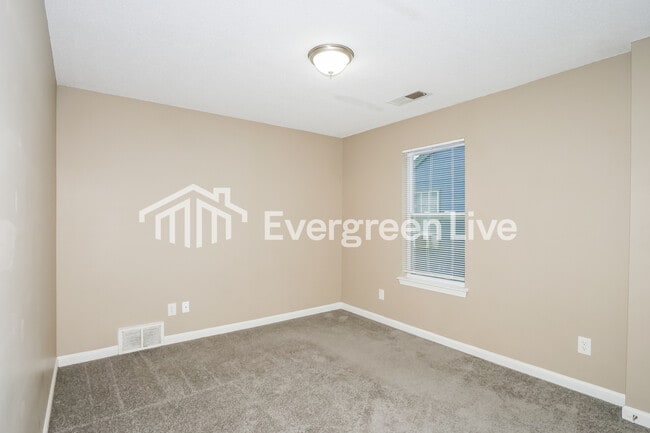 Building Photo - 6000 Wagon Hill Rd E