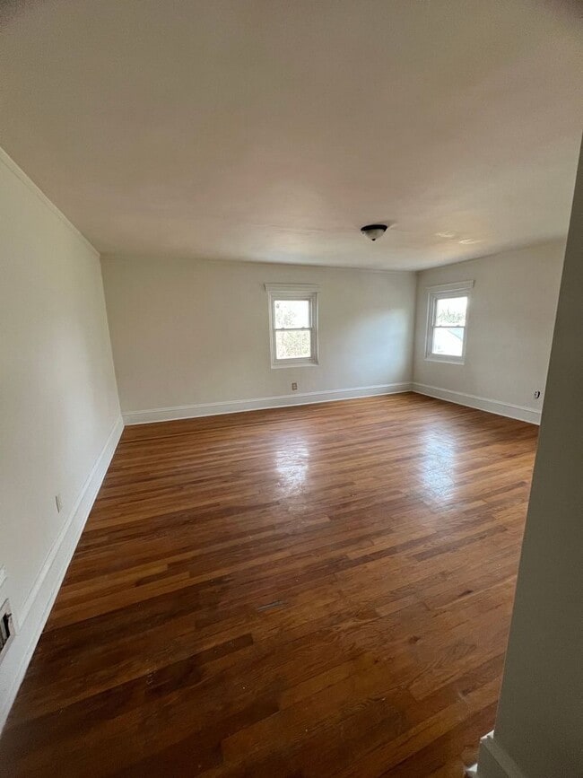 Building Photo - Spacious 4-Bedroom Brick Home with Hardwood Floors and Walk-In Closet