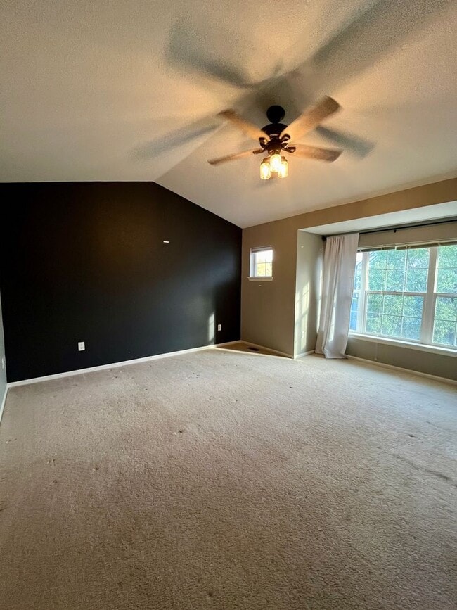 Building Photo - South Longmont Townhome with Attached Garage & Private Patio