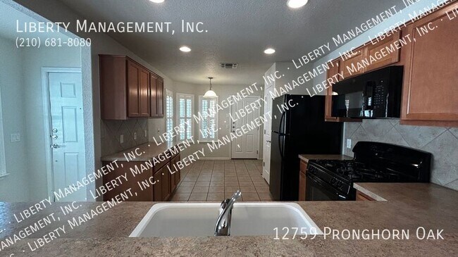 Building Photo - 12759 Pronghorn Oak