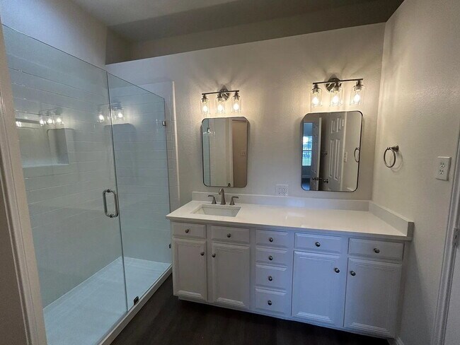 Building Photo - Charming 3-Bedroom Plano Retreat with Cozy Fireplace & Gleaming Hardwood Floors!