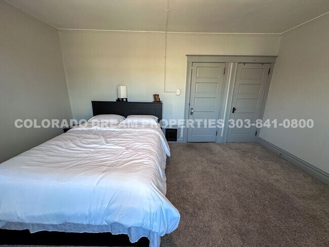 Building Photo - A home where old-world charm meets modern sophistication!