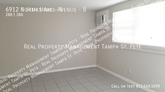 Building Photo - 6912 N Himes Ave