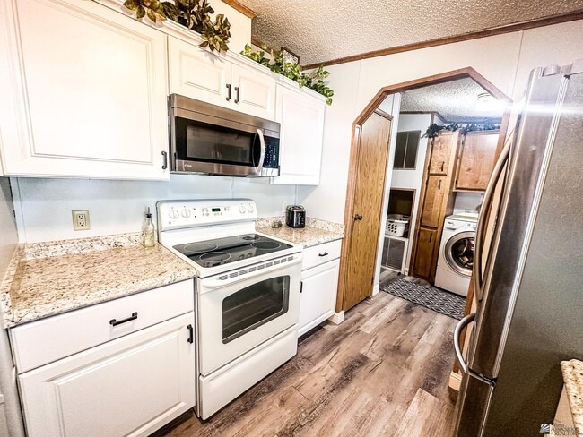 Building Photo - 13240 E 50th Dr