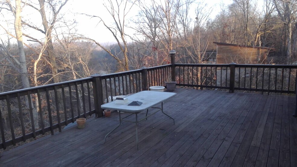 large back deck overlooking Piney River - 6832 Piney River Rd N